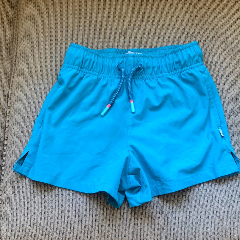 Ocean Coast girls shorts with pockets on sides, white liner, teal color, size M